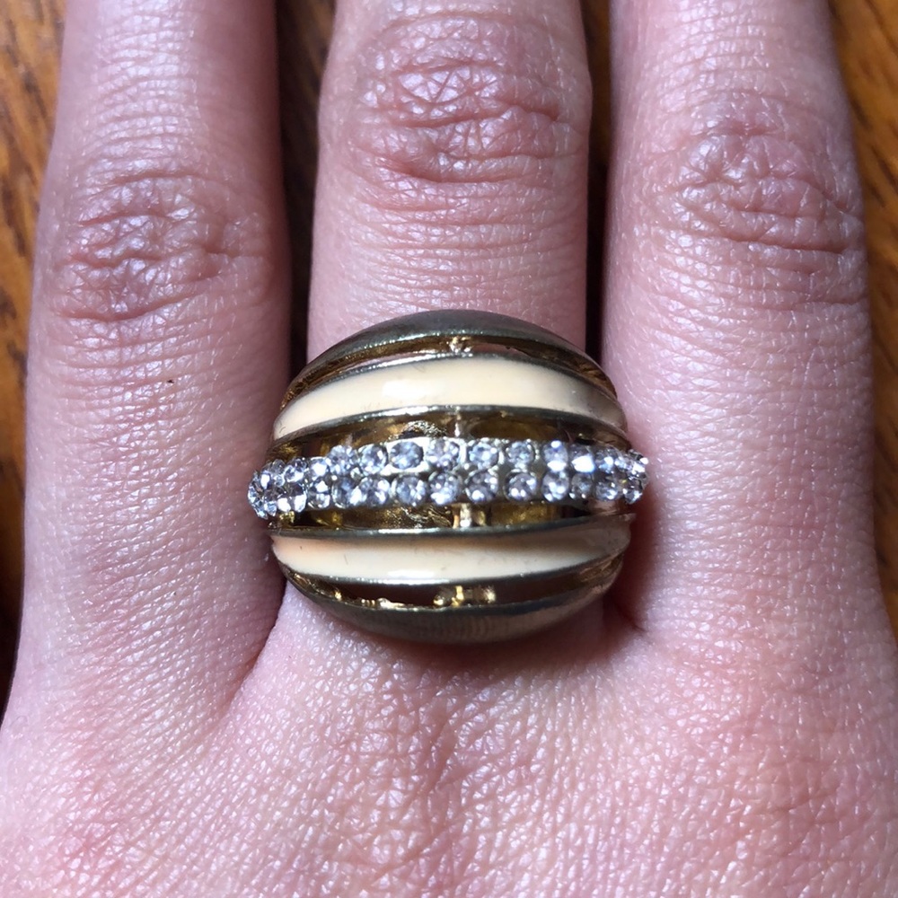 Cream/orange golden ring with diamonds